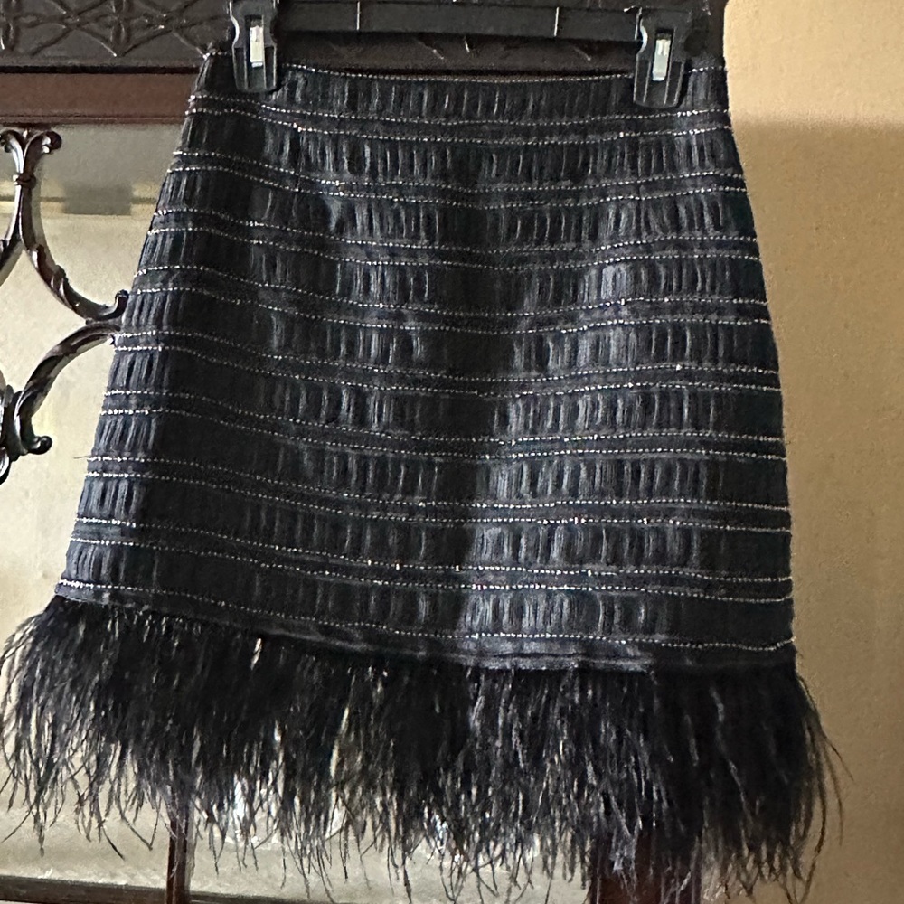 Sugar-Lips2 black skirt w/ black double rows rhinestones & feather hemline.